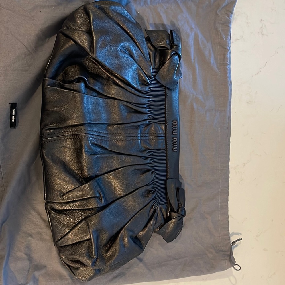 Miu Miu leather clutch